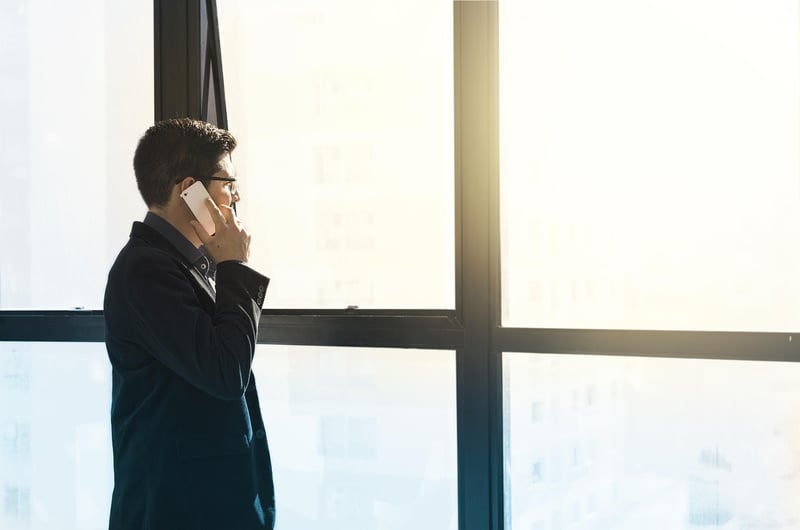 Businessman contemplating